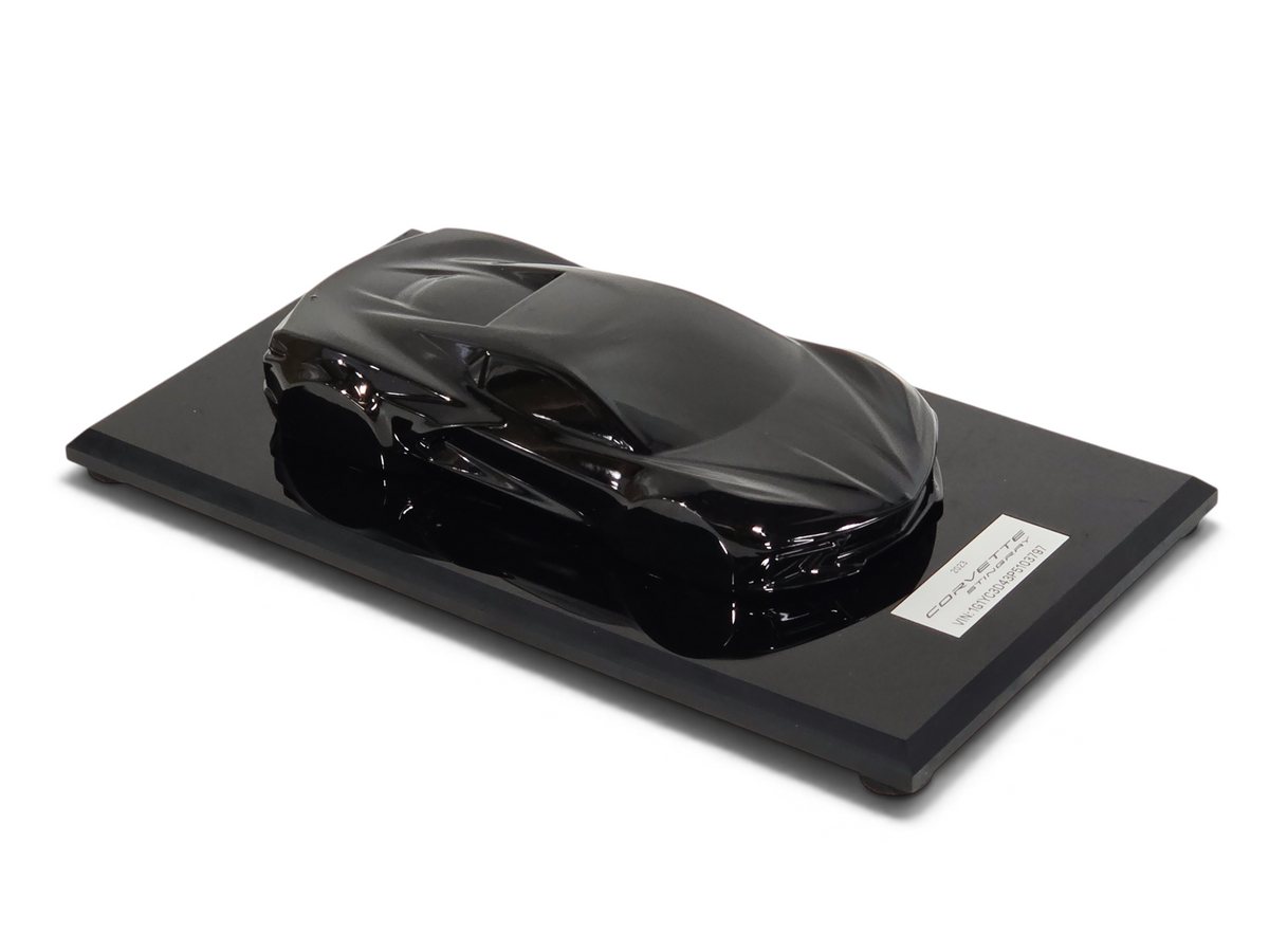 Send it Auto Parts 2023 Corvette C8 black speedshape model on a display base, 1:18 scale automotive design study.