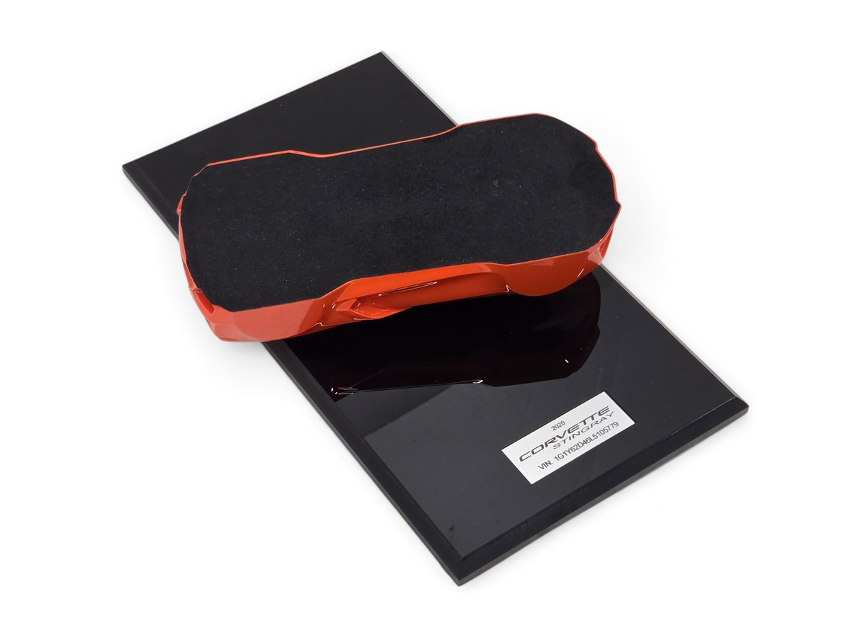 Send it Auto Parts 2020 Corvette C8 Stingray speedshape model in Sebring Orange on a black display base