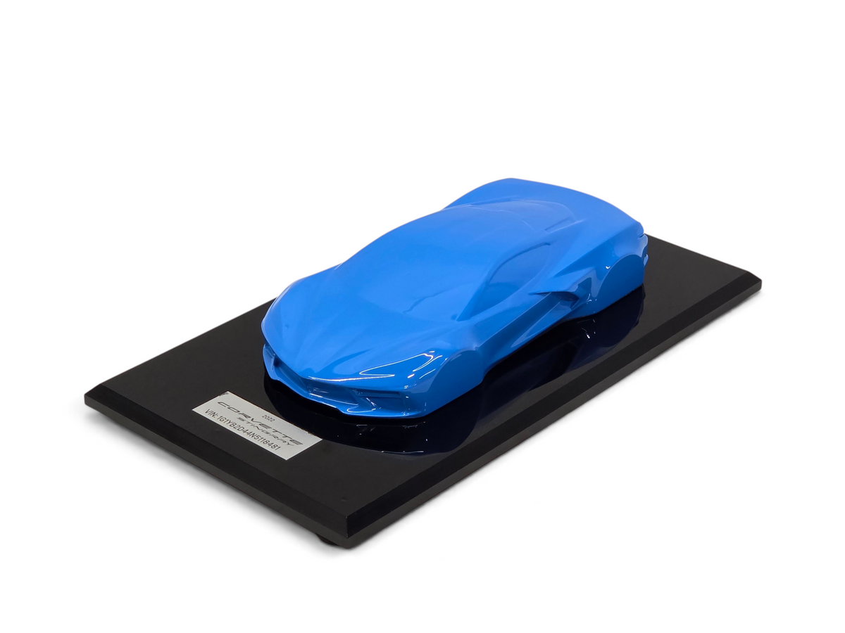 Send it Auto Parts 2022 Corvette C8 Stingray 1:18 scale speedshape model in Rapid Blue on a black display base