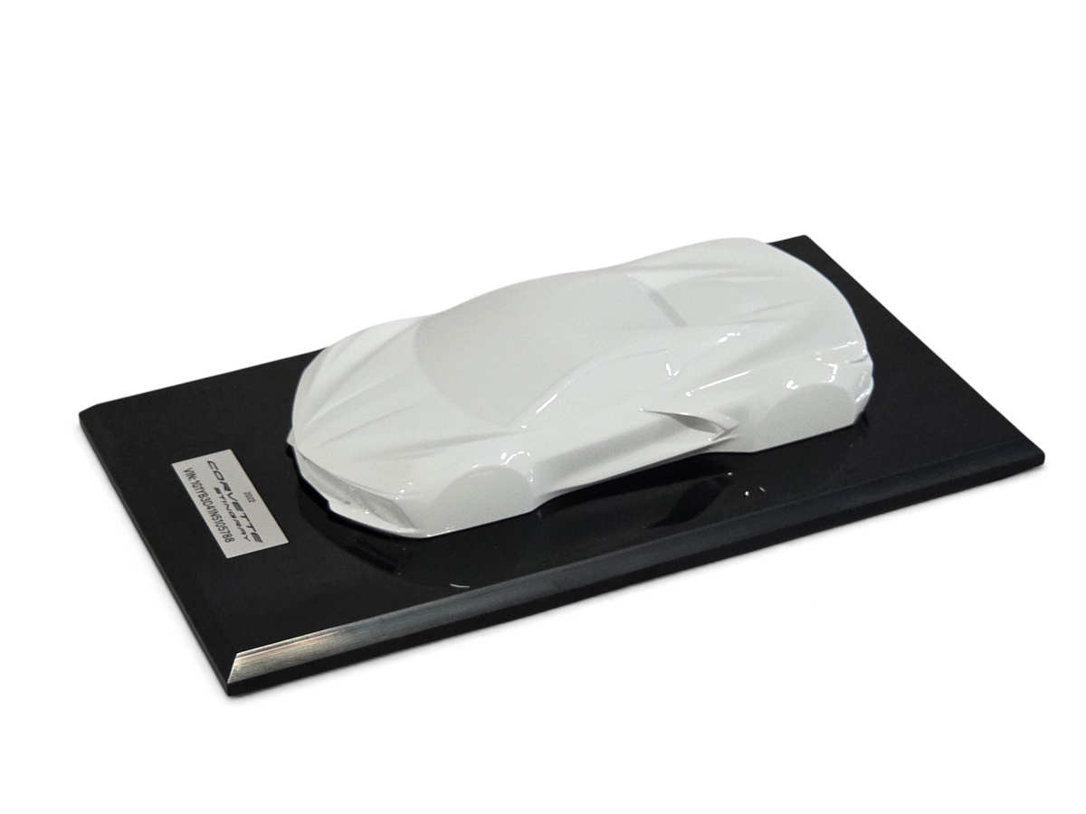 Send it Auto Parts 2022 Corvette C8 Stingray Arctic White 1:18 scale speedshape model on a black display base