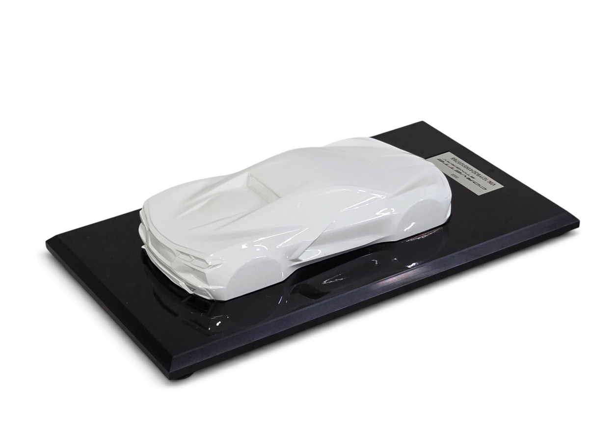 Send it Auto Parts 2022 Corvette C8 Stingray 1:18 scale speedshape model in Arctic White on a black display base.