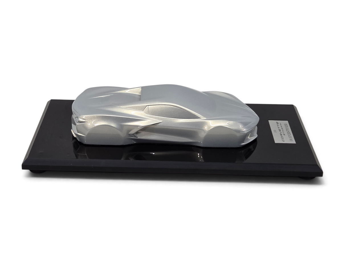 Send it Auto Parts 2023 Corvette C8 Stingray silver flare speedshape model on a black display base