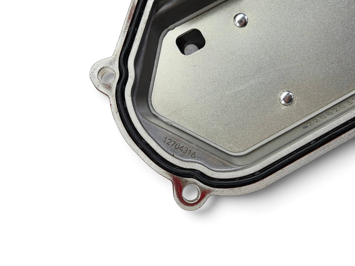 Send it Auto Parts OEM Chevy Corvette C8 LT2 engine valve cover with part number 12704316 visible on metal surface