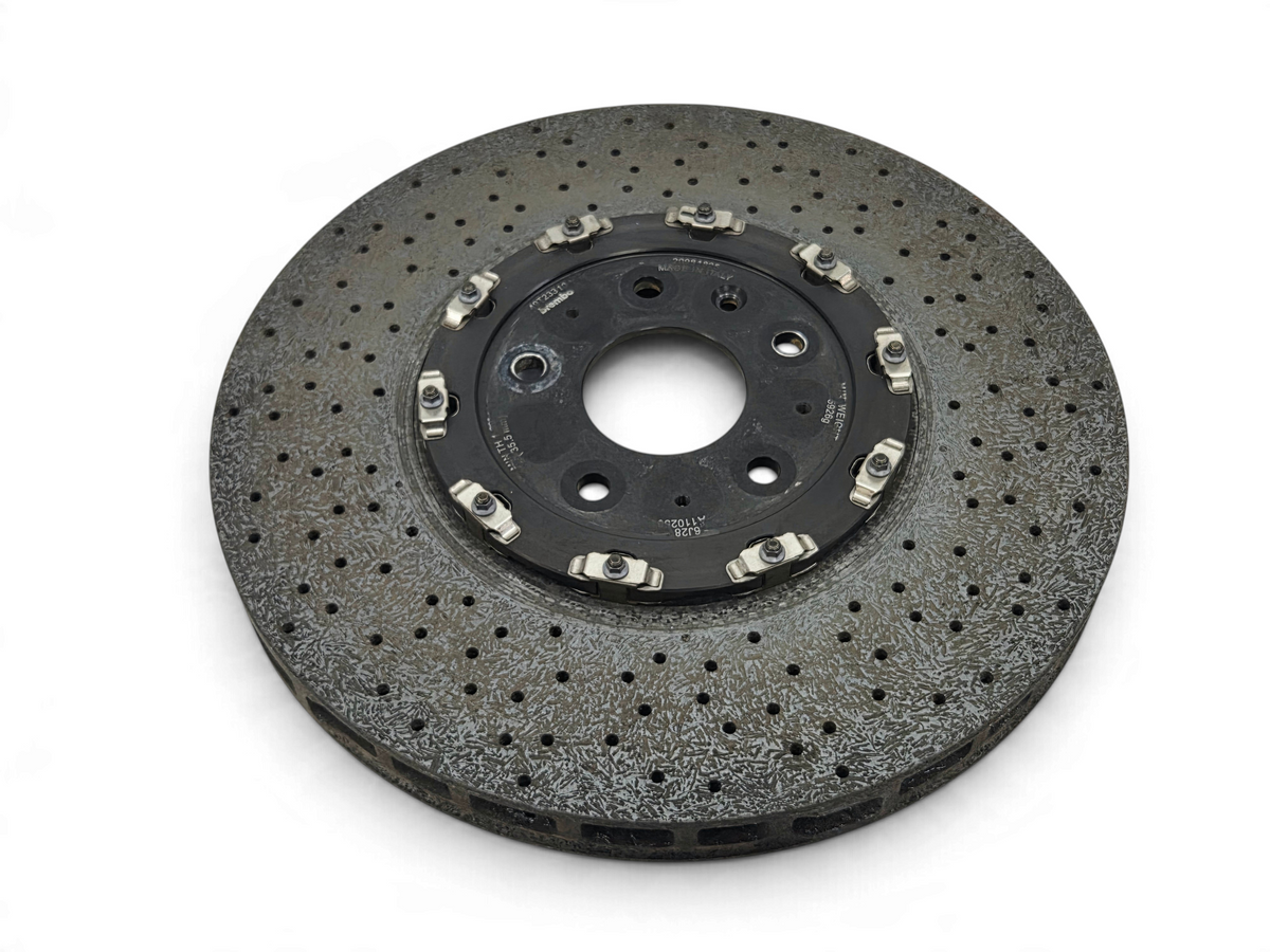 Send it Auto Parts carbon ceramic front brake rotor for Chevrolet Corvette C7 Z06 with visible surface chip