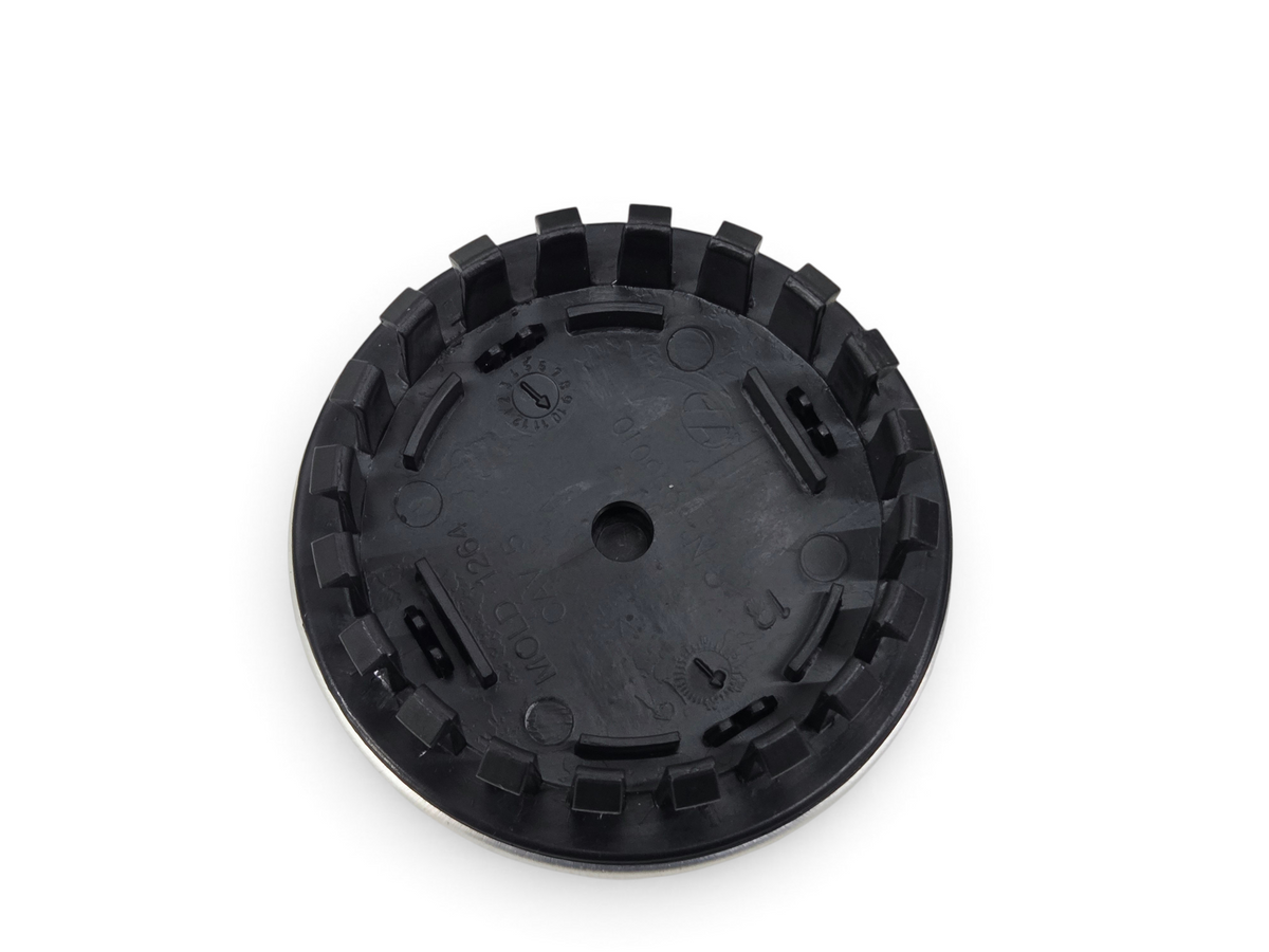 Send it Auto Parts OEM black plastic back view of a C8 Corvette wheel center cap with Jake Racing logo