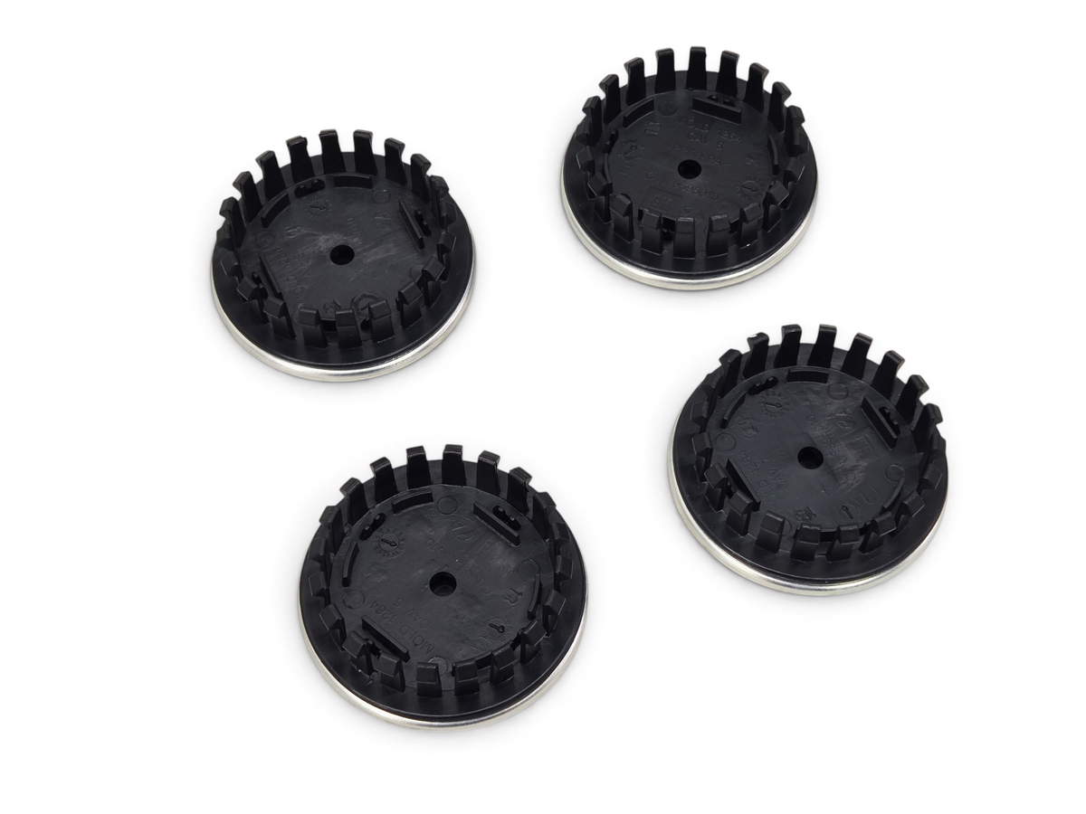 Send it Auto Parts OEM GM Corvette C8 wheel center caps with Jake Racing logo, showing black plastic back view