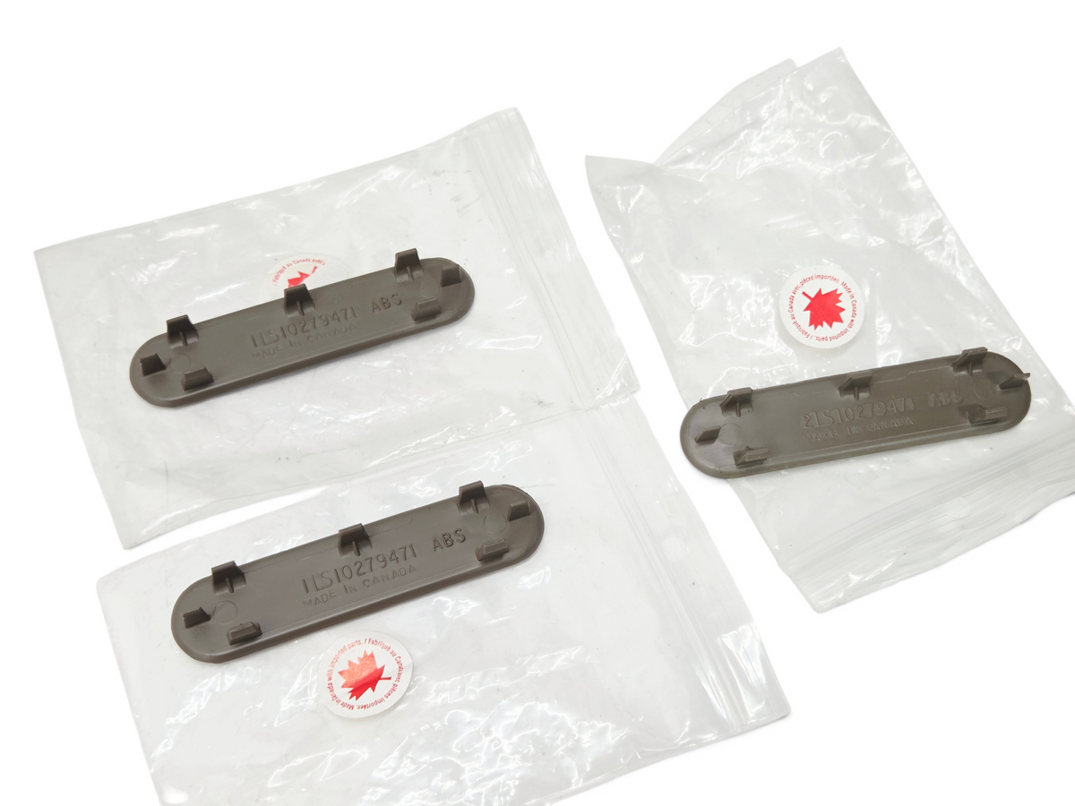 Send it Auto Parts OEM neutral shale door panel plugs for 2003-2004 Corvette C5, set of three in plastic packaging.