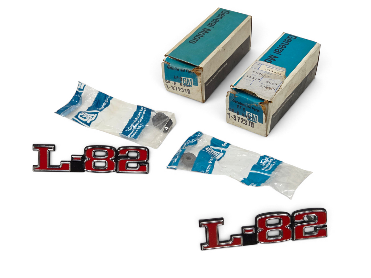 Send it Auto Parts pair of OEM GM L-82 hood emblems for 1975-1979 Corvette C3 with original boxes and mounting nuts