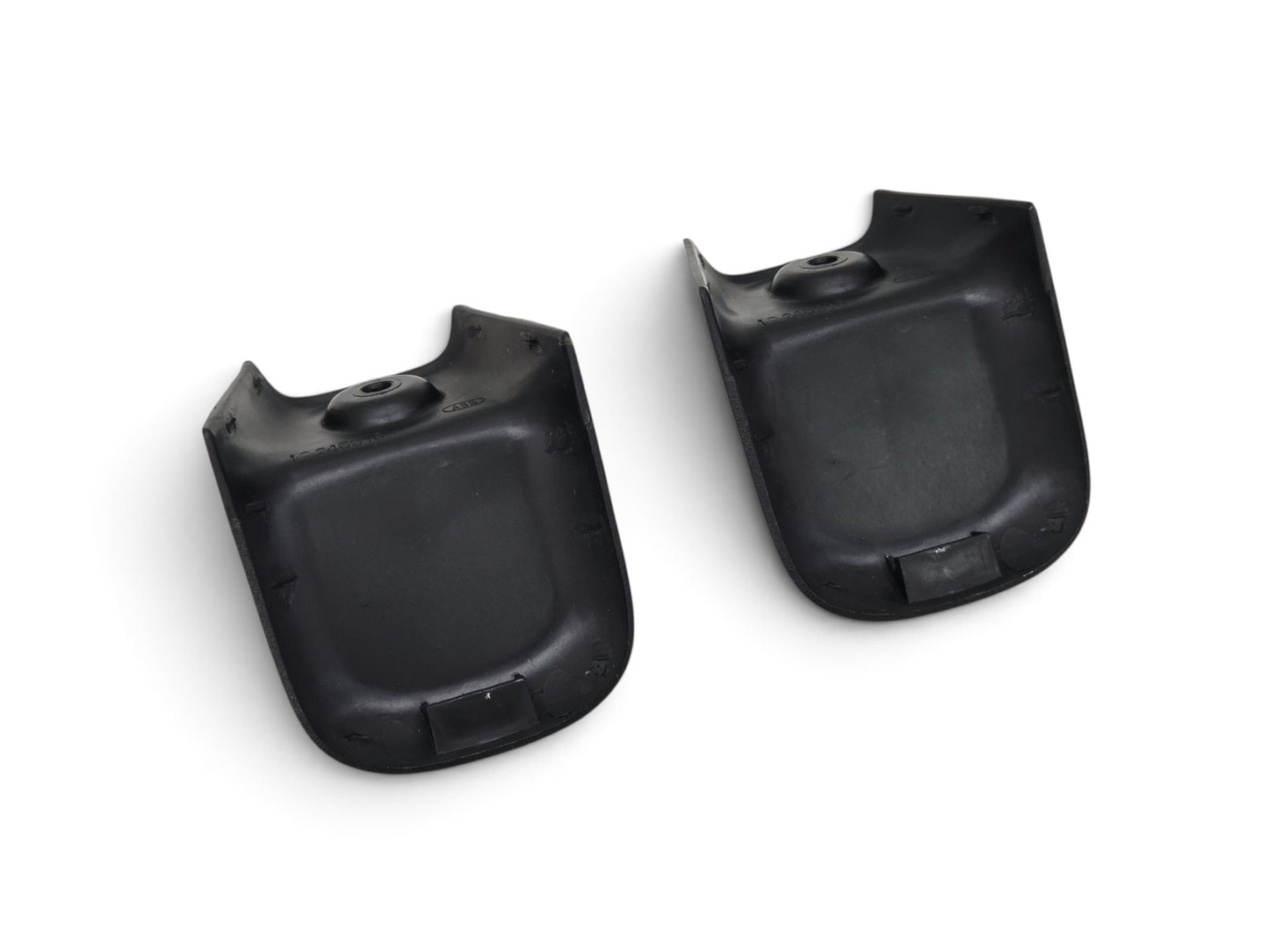 Send it Auto Parts pair of black plastic OEM seat track covers for Chevy Corvette C5 and C6 models.