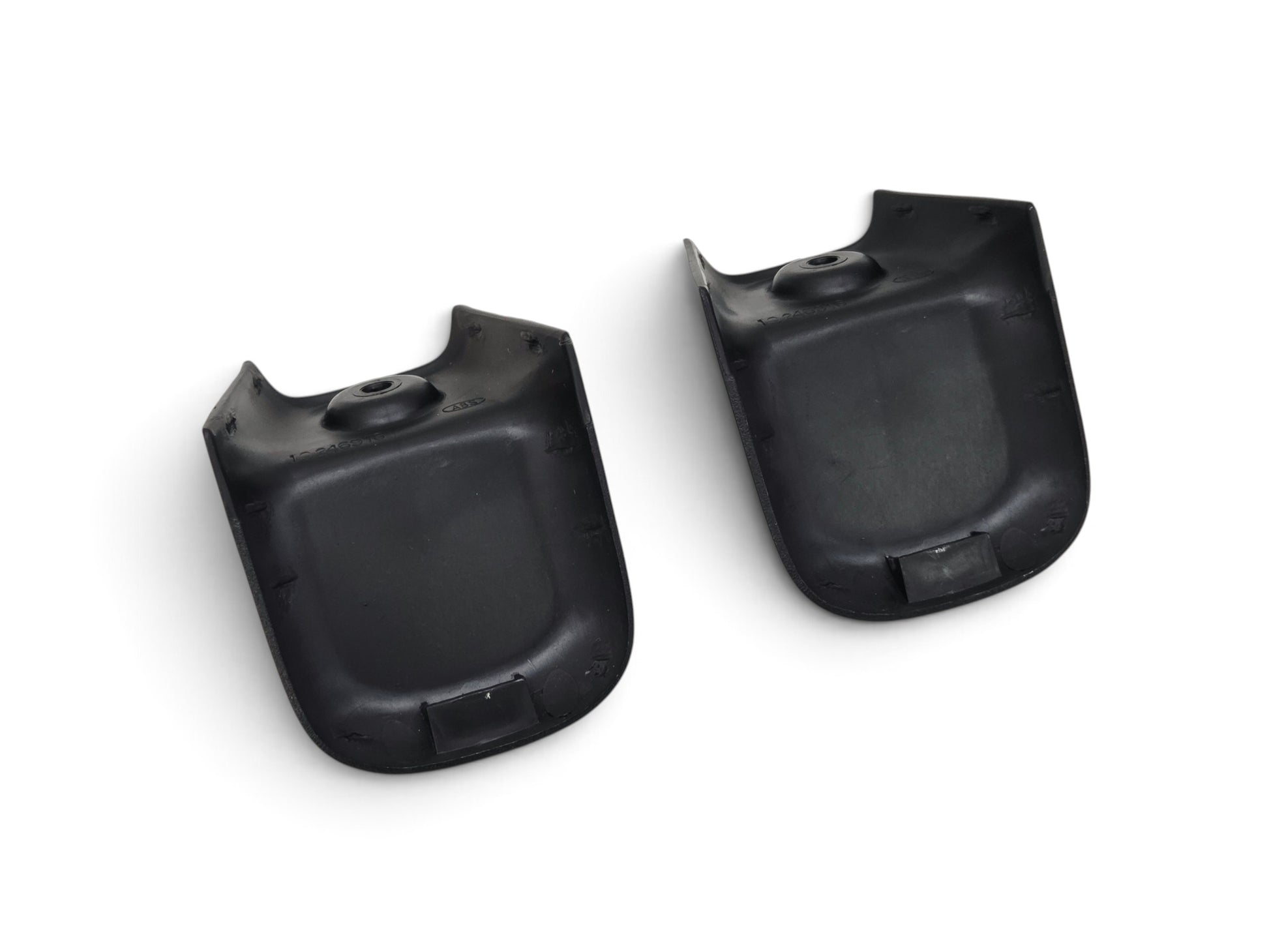 Send it Auto Parts pair of black plastic OEM seat track covers for Chevy Corvette C5 and C6 models.