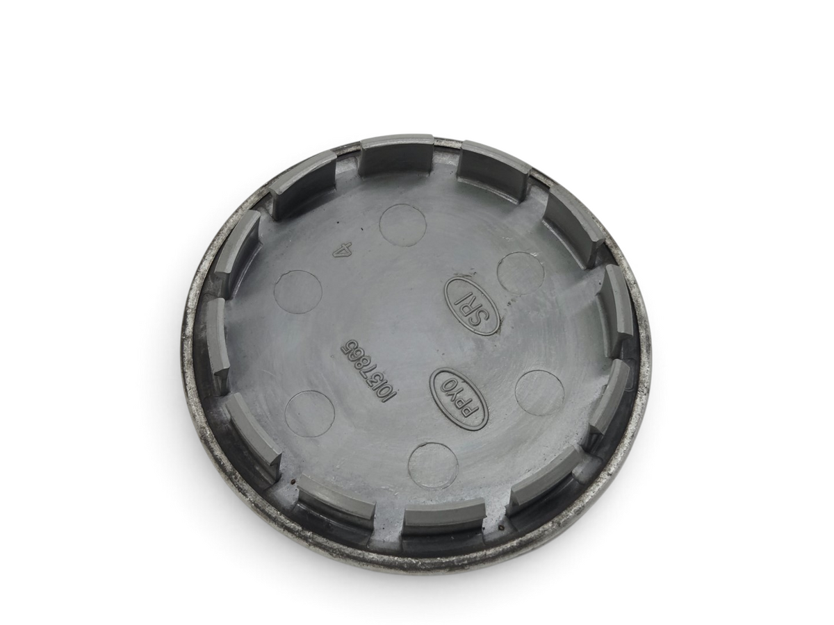 Send it Auto Parts OEM silver wheel center cap for 1991-1995 Corvette C4 ZR-1 showing the back side with part number