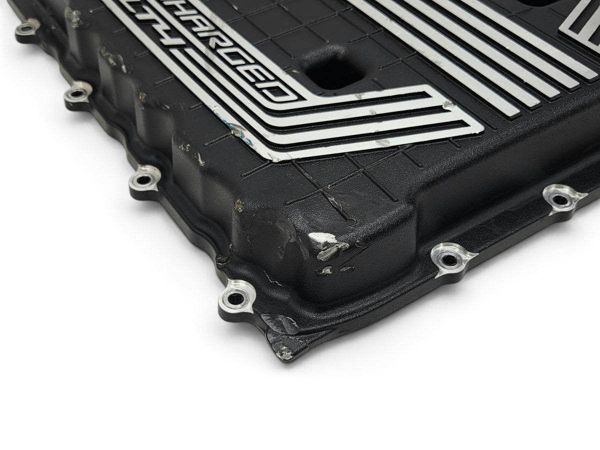 Send it Auto Parts damaged OEM GM supercharger cover lid for Chevy Camaro ZL1 6.2L LT4 engine with visible cracks