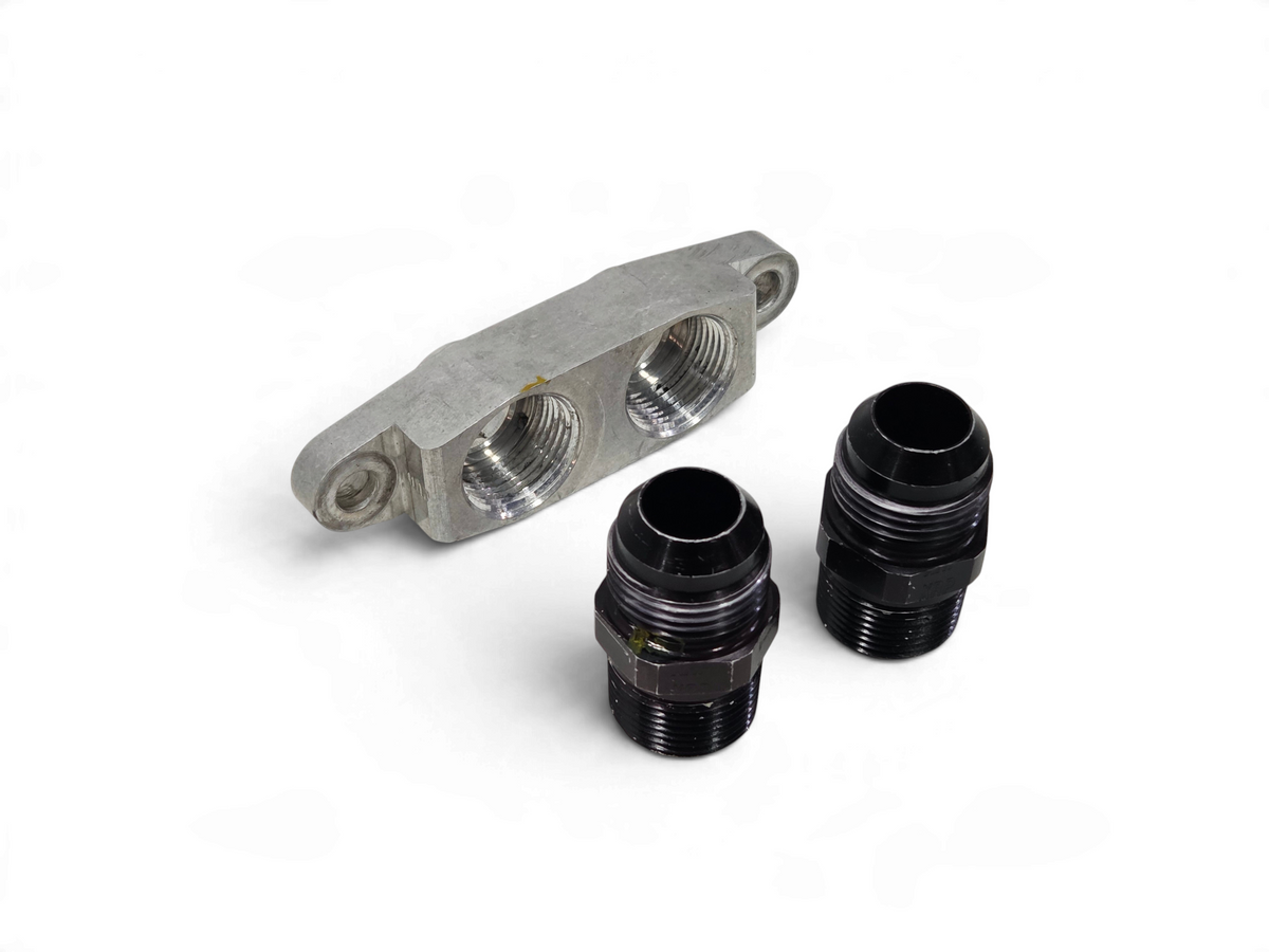 Send it Auto Parts OEM GM dry sump oil pan adapter kit with two black AN fittings for LT1, LT4, LS7, and LS9 engines.