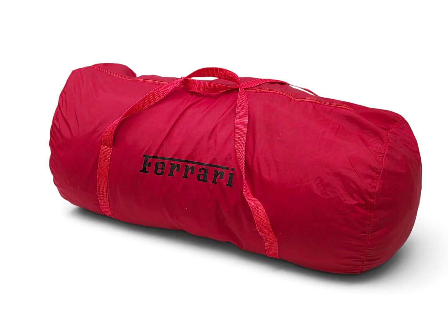 Send it Auto Parts red Ferrari California indoor car cover in a branded storage bag with light staining