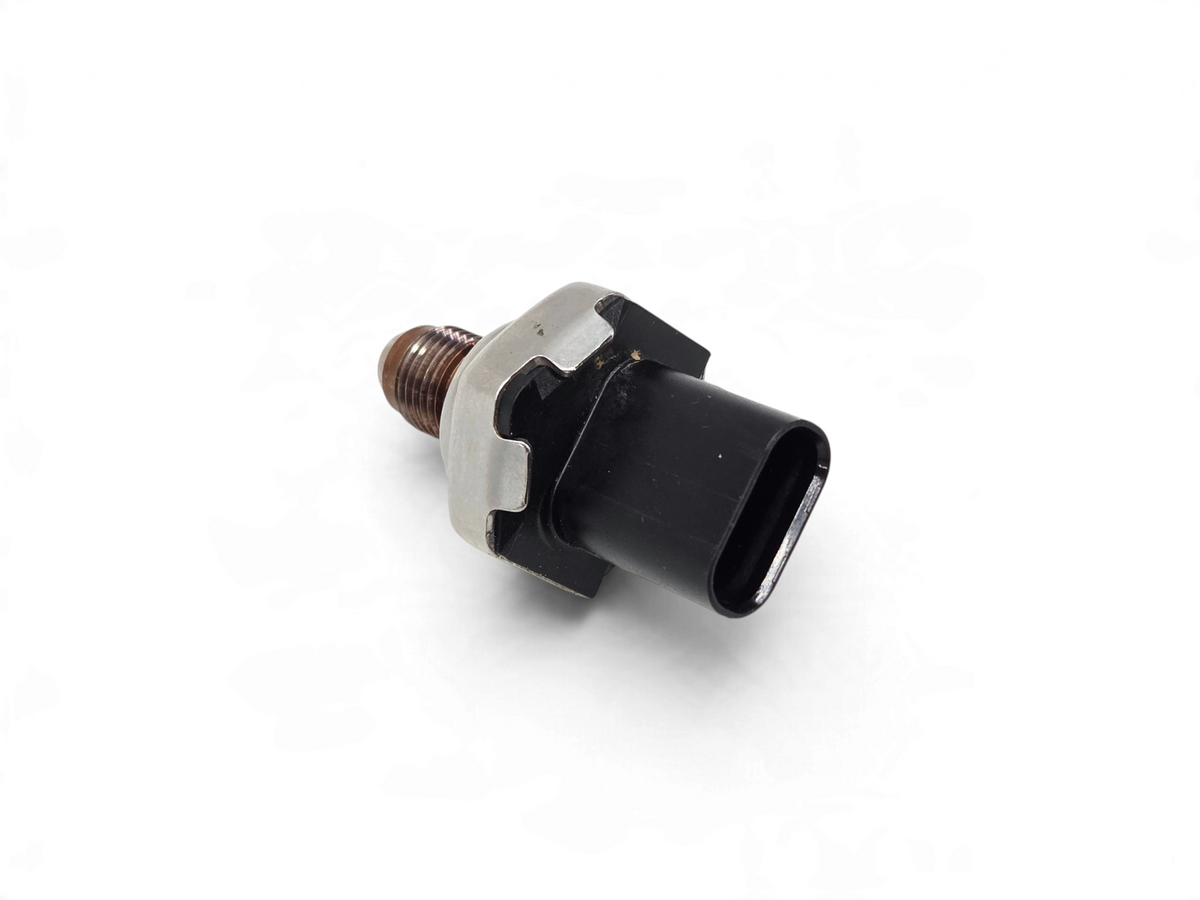 Genuine OEM GM fuel injection rail pressure sensor from Send it Auto Parts, featuring a metal threaded end.