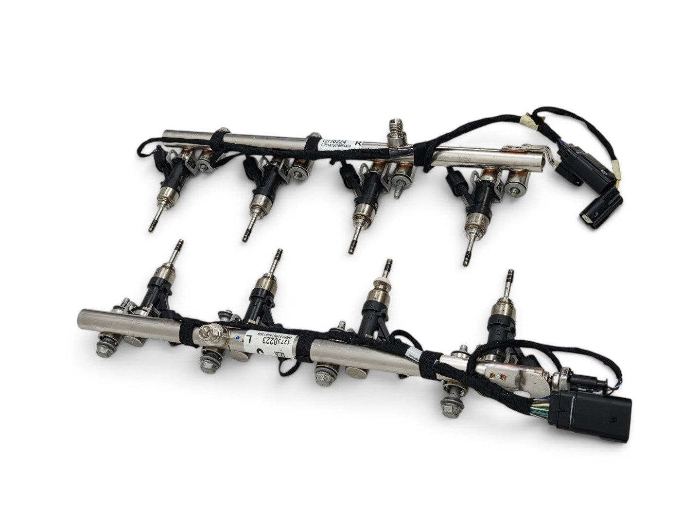 Send it Auto Parts OEM fuel rails and injectors with 6mm tips for GM 6.2L and 6.6L engines.