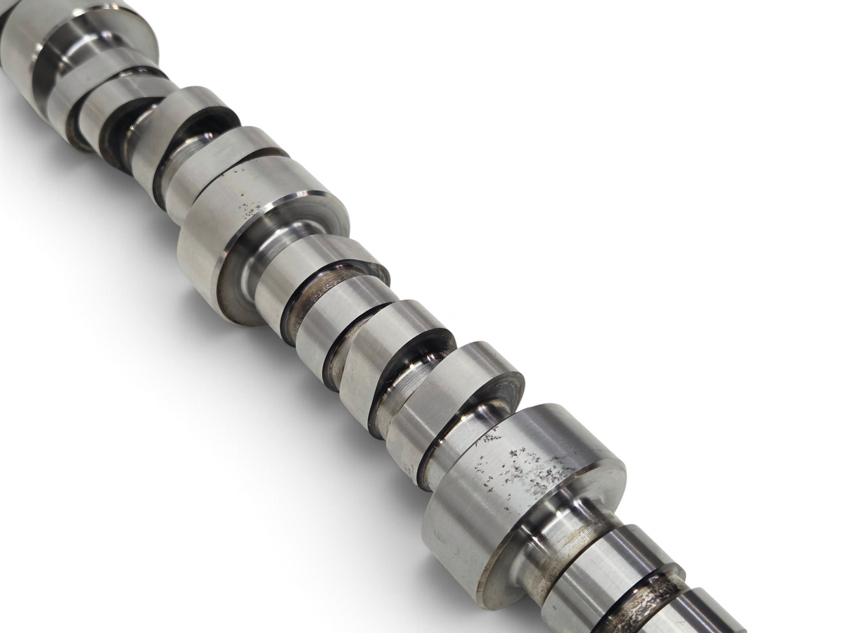 Send it Auto Parts GM 350 engine high output camshaft with visible pitting on the bearing surface