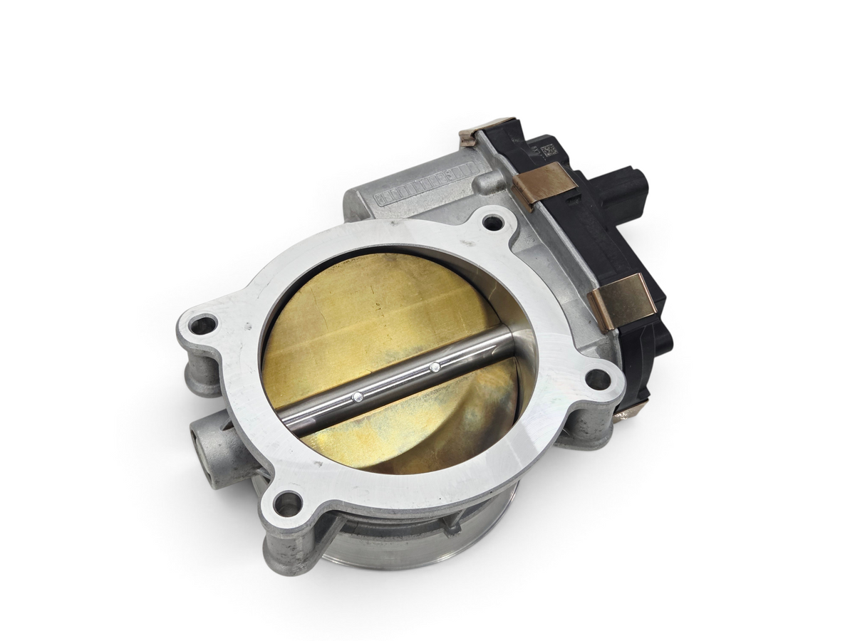 Send it Auto Parts ACDelco GM fuel injection throttle body with brass butterfly valve and silver metal housing.