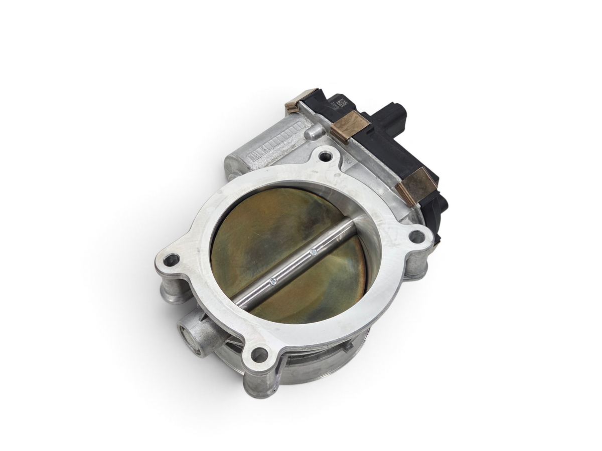 Send it Auto Parts genuine OEM GM fuel injection throttle body for LT engine series, silver metal construction.