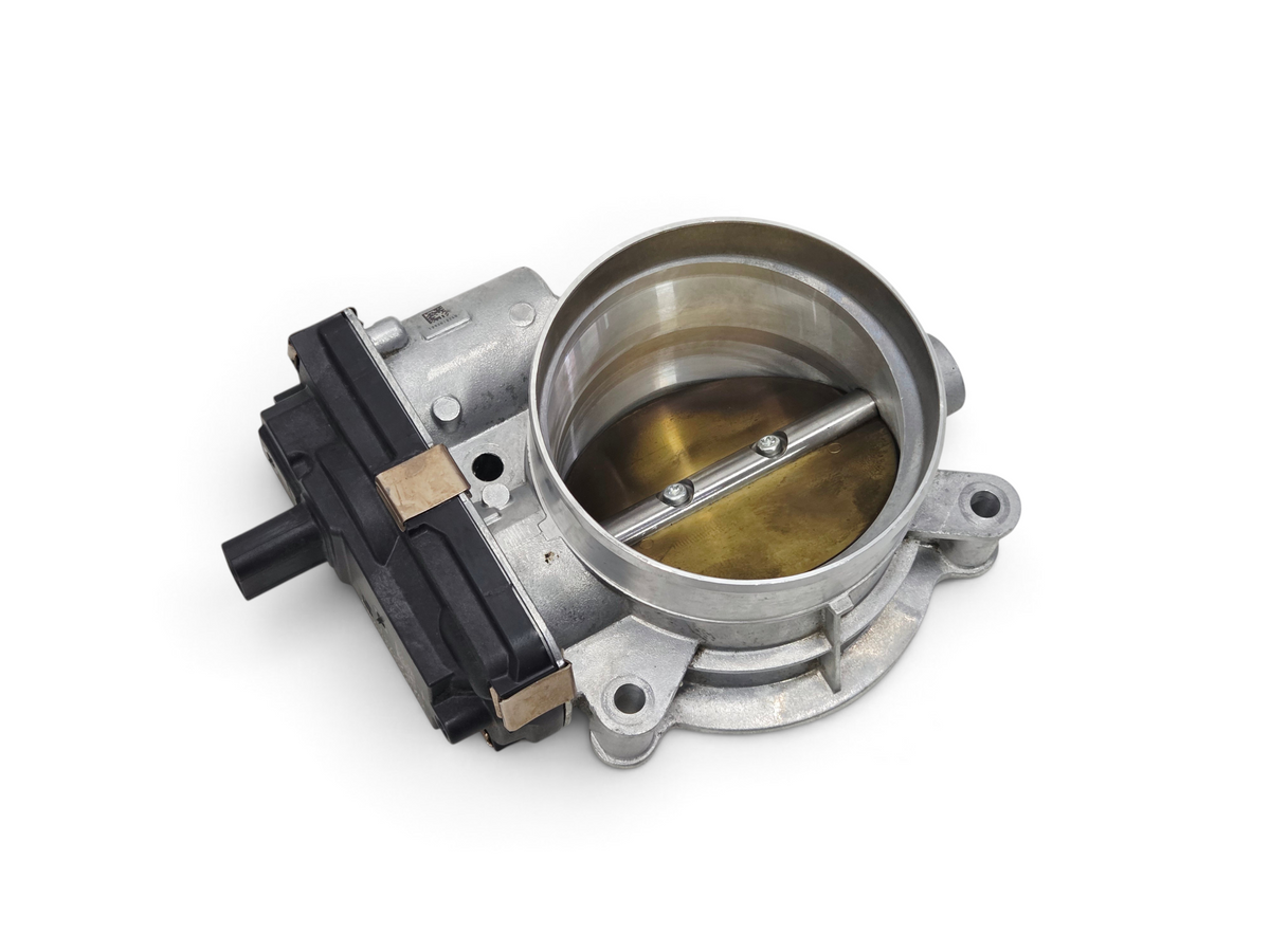 Send it Auto Parts genuine OEM GM fuel injection throttle body for LT engine series, silver metal construction.