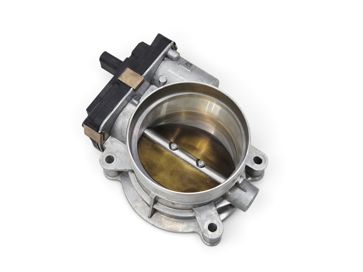 Send it Auto Parts genuine OEM GM fuel injection throttle body for LT engine series, silver metal and black plastic.