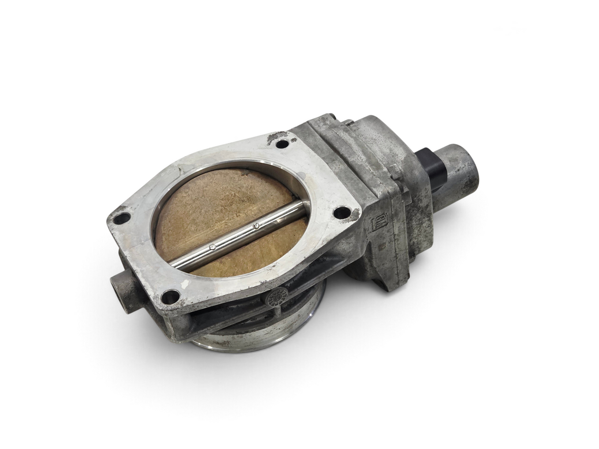 Send it Auto Parts OEM GM LS3 LS7 gold blade throttle body for Chevrolet V8 engines, showing intake and housing.