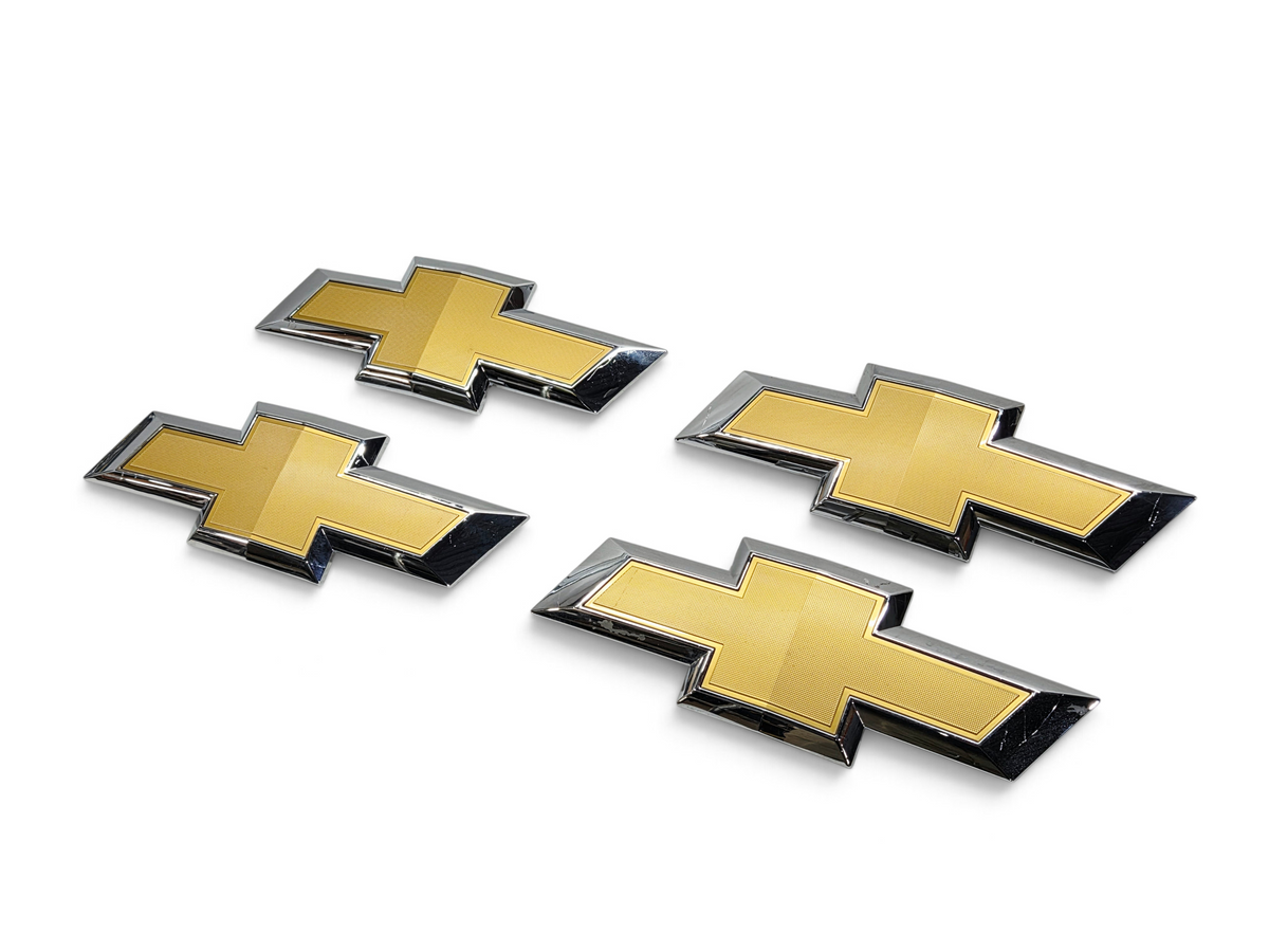 Send it Auto Parts lot of four gold and chrome Chevrolet Silverado 1500 front grille bowtie emblems