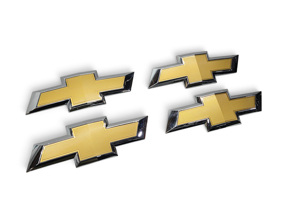Send it Auto Parts lot of four gold Chevrolet Silverado 1500 front grille bowtie emblems with chrome trim