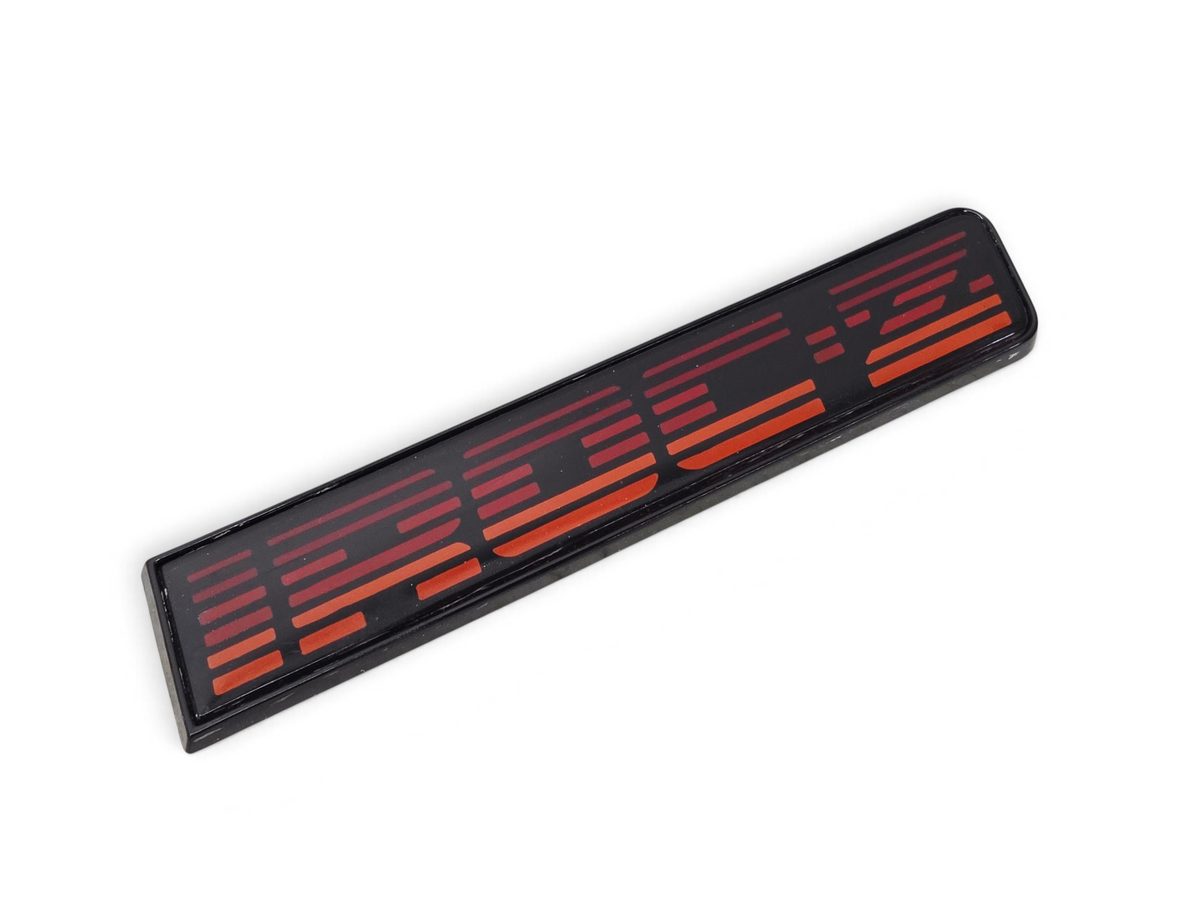 Send it Auto Parts OEM red and black IROC-Z rocker panel emblem for 1982-1992 Chevrolet Camaro