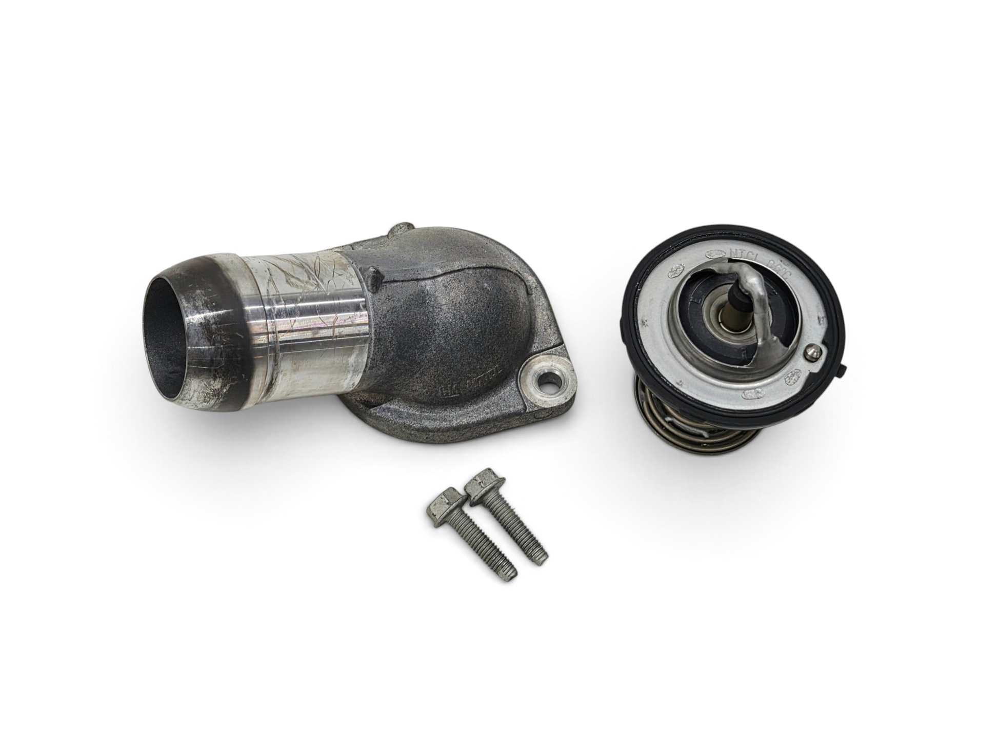 Send it Auto Parts OEM GM LS engine thermostat housing and water neck with thermostat and mounting bolts