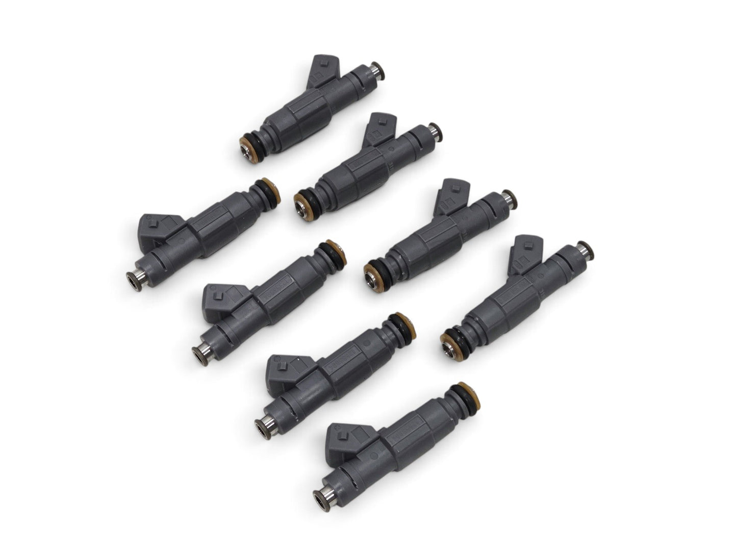 Send it Auto Parts set of 8 OEM GM LS1 fuel injectors for 1999-2000 Chevrolet Corvette and Camaro 5.7L V8 engines.