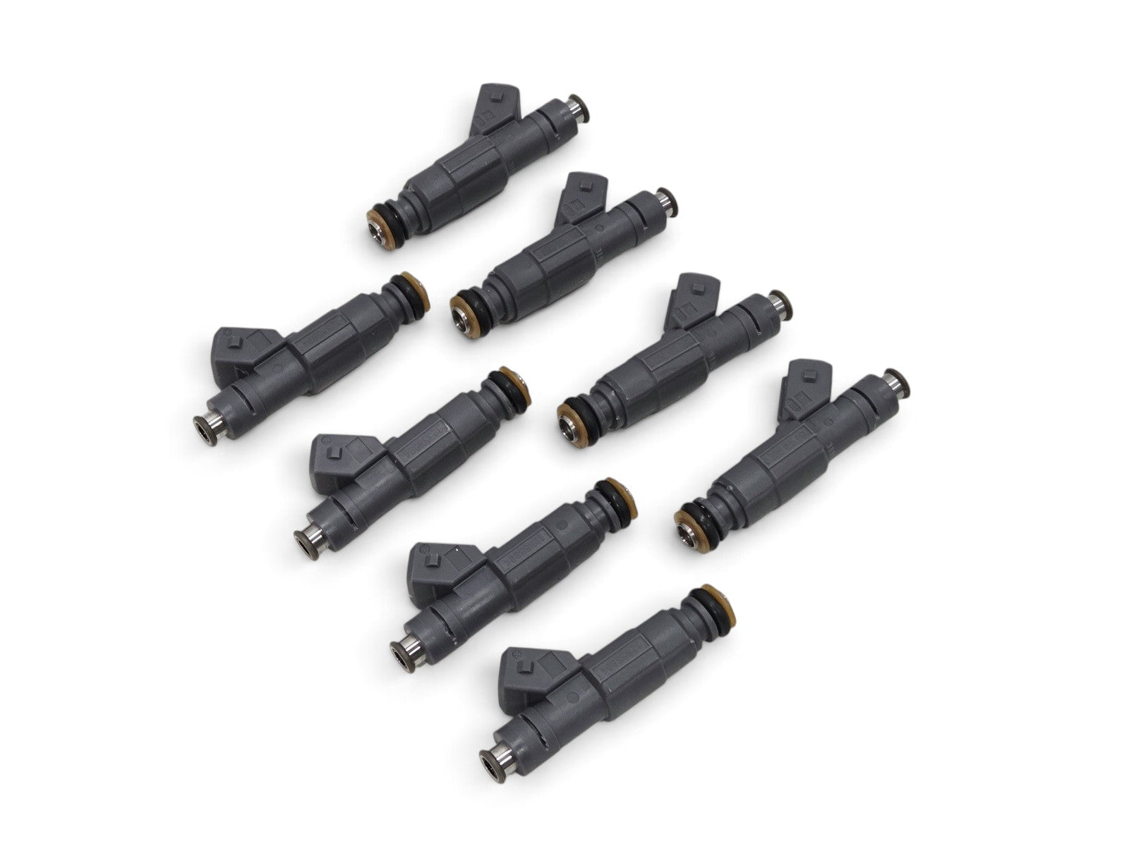 Send it Auto Parts set of 8 OEM GM LS1 fuel injectors for 1999-2000 Chevrolet Corvette and Camaro 5.7L V8 engines.