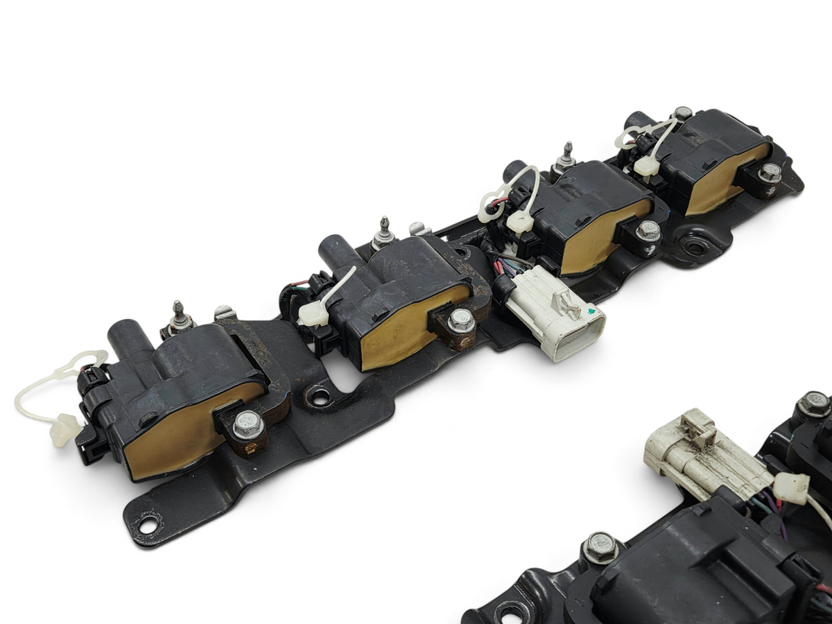Send it Auto Parts OEM GM LS1 LS6 ignition coil bracket set with harness for Corvette, Camaro, and Firebird engines.