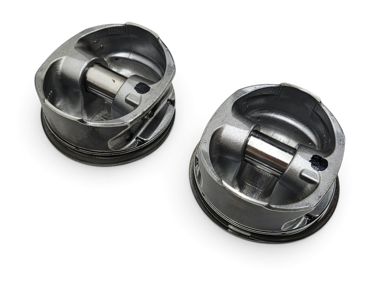 Send it Auto Parts OEM GM 6.2L LS3 L92 L99 flat top pistons with wrist pins, removed from a low-mileage vehicle.