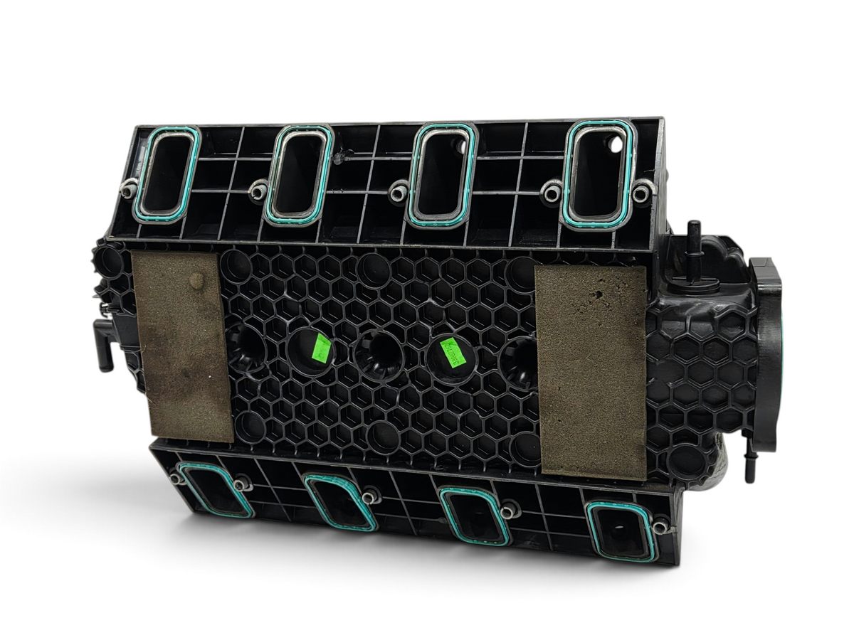 Send it Auto Parts OEM GM 12602477 intake manifold for 6.2L LS3 V8 engines, black plastic with green gaskets.