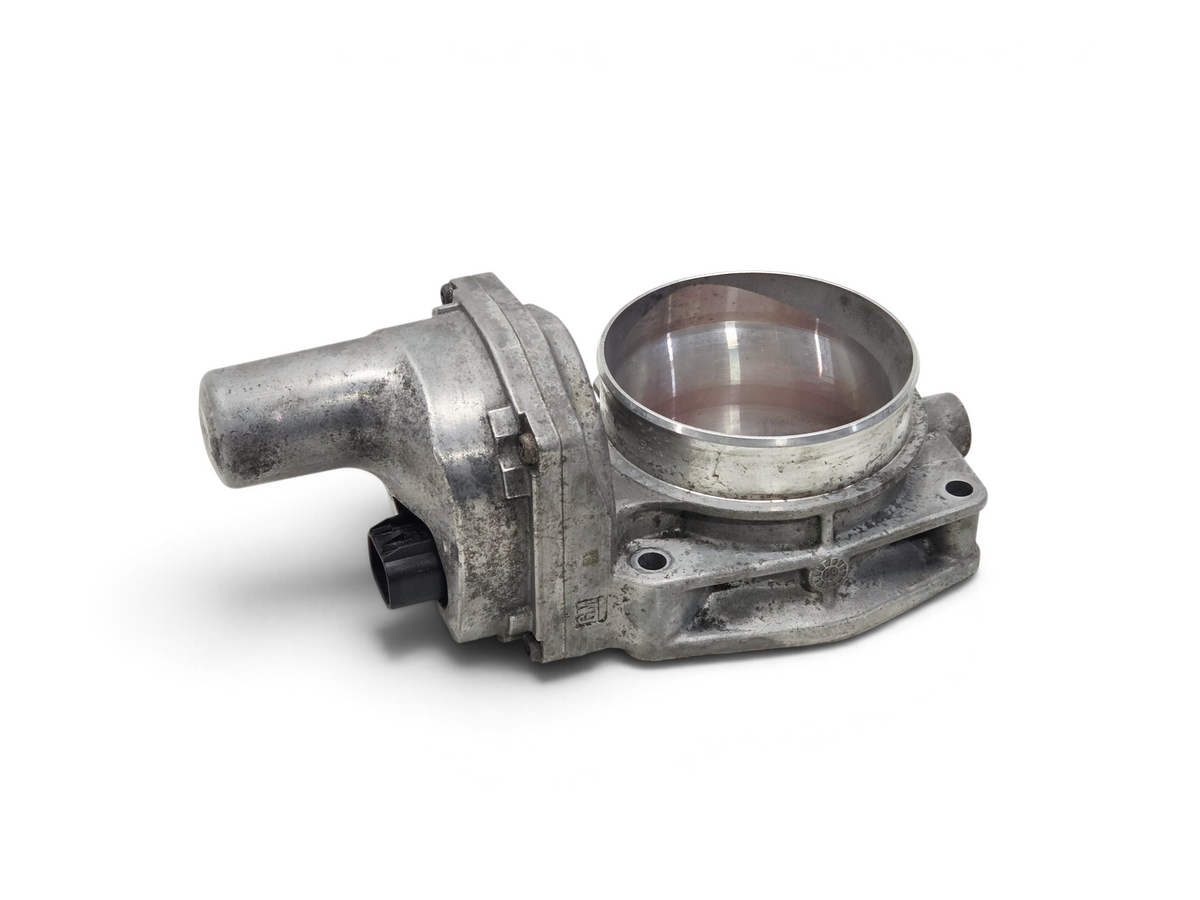 Send it Auto Parts OEM GM LS3 LS7 gold blade throttle body for Chevrolet V8 engines, showing metal housing.