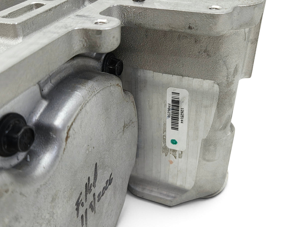 Send it Auto Parts OEM LS9 supercharger for Corvette C6 ZR1 with part number 12625144 label visible