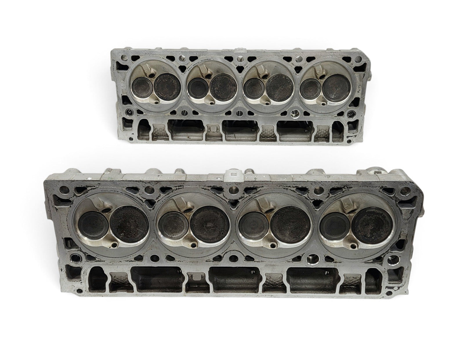 Send it Auto Parts OEM GM LT4 6.2L cylinder heads for Corvette and Camaro with large injector holes and lash caps.
