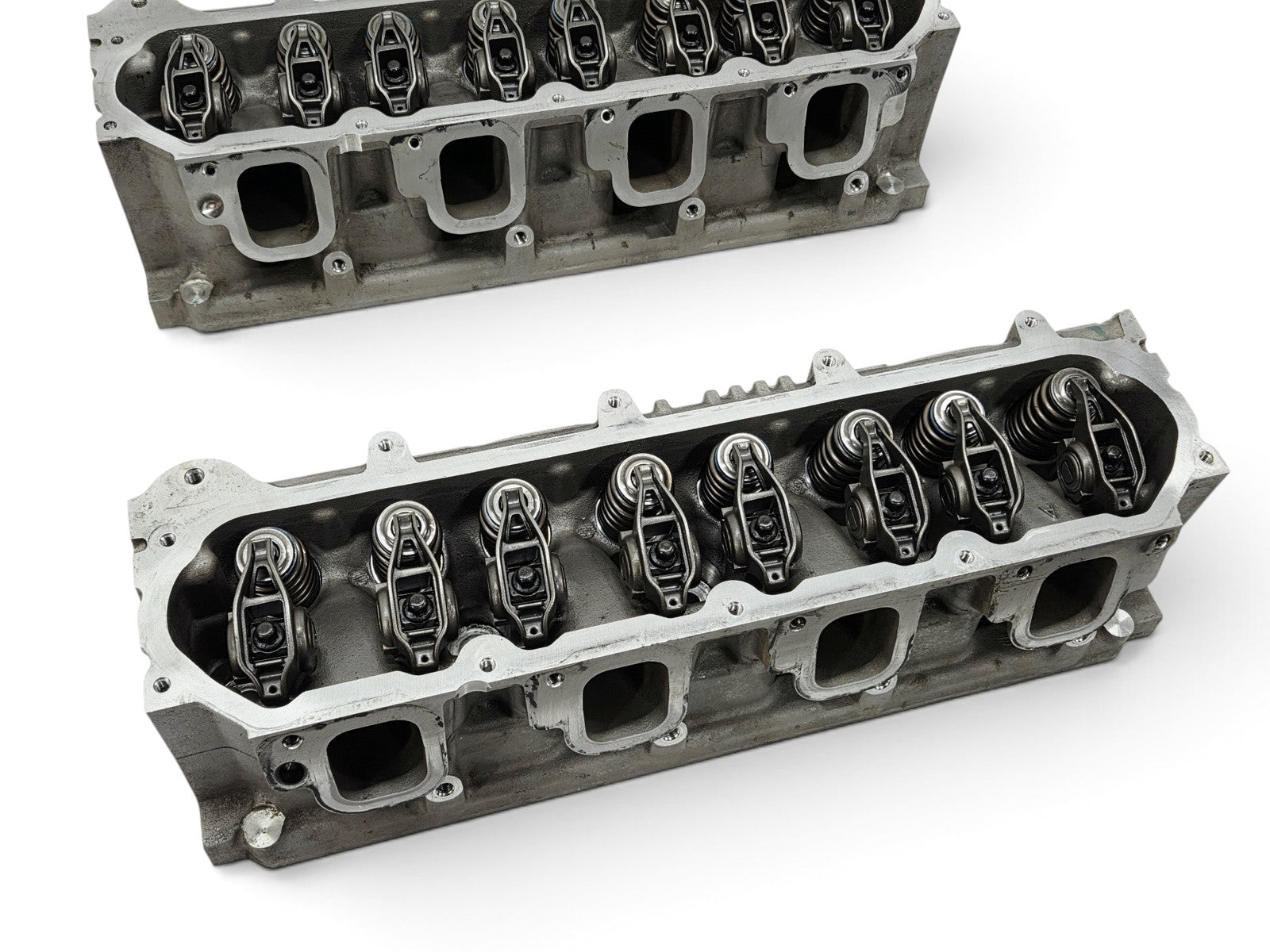 Send it Auto Parts pair of OEM GM LT4 6.2L cylinder heads with valve train components for Corvette and Camaro engines.