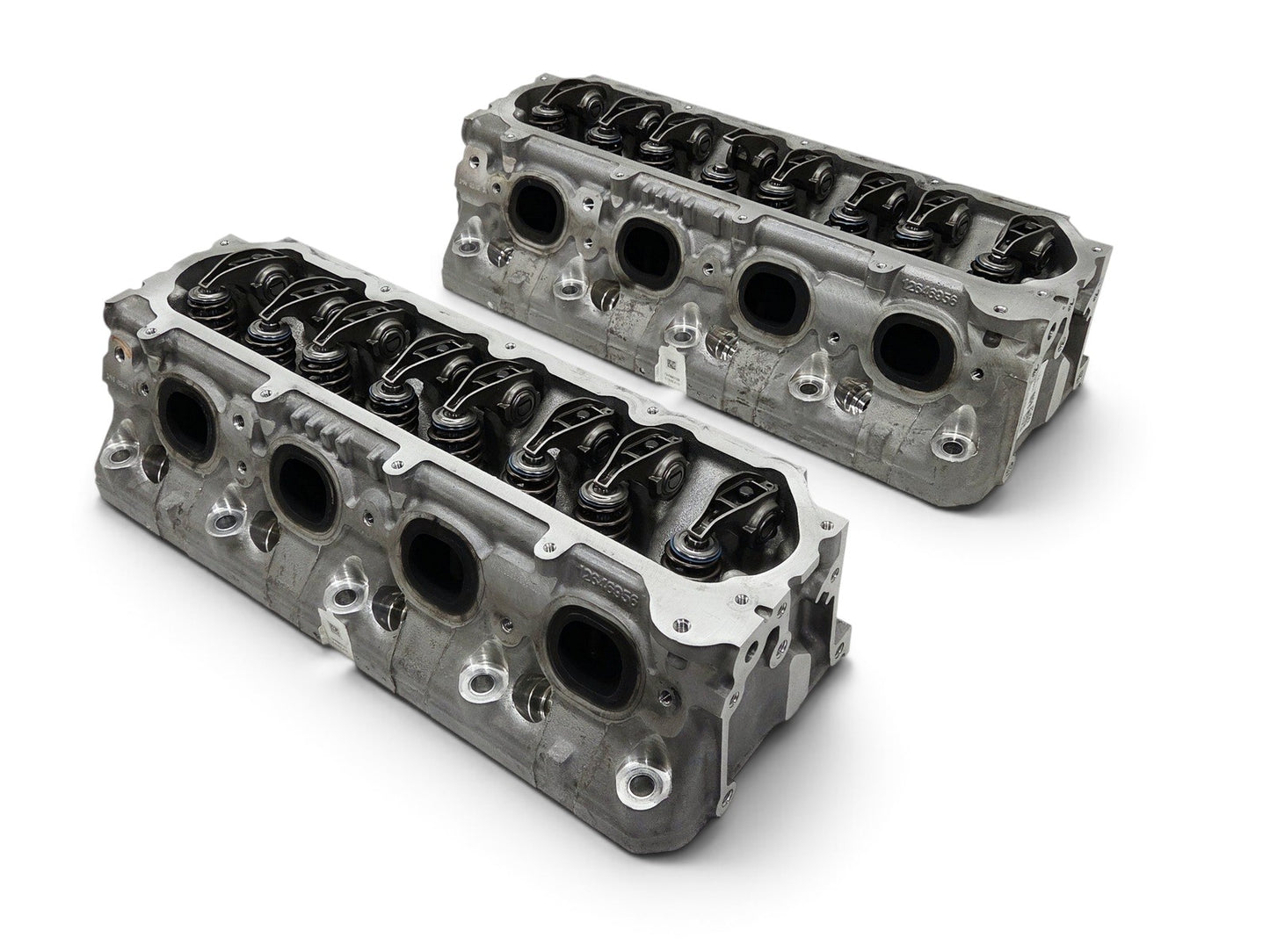 Send it Auto Parts pair of OEM GM LT4 6.2L cylinder heads with lash caps for Corvette, Camaro, and Cadillac models.