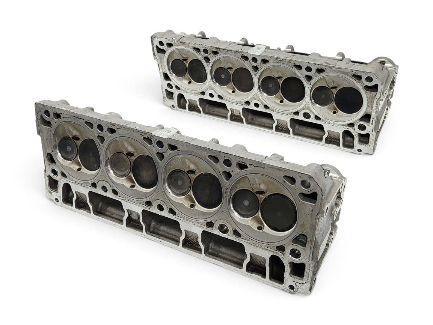 Send it Auto Parts pair of OEM GM LT4 6.2L cylinder heads for Corvette and Camaro with large injector holes.