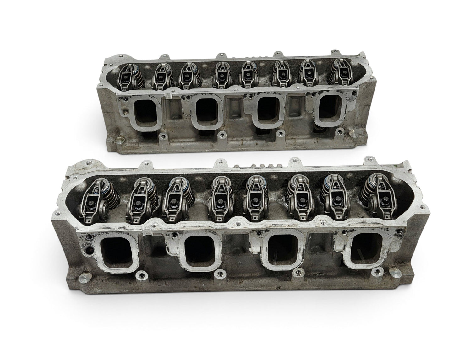 Send it Auto Parts pair of OEM GM LT4 6.2L cylinder heads for Corvette and Camaro with lash caps included.