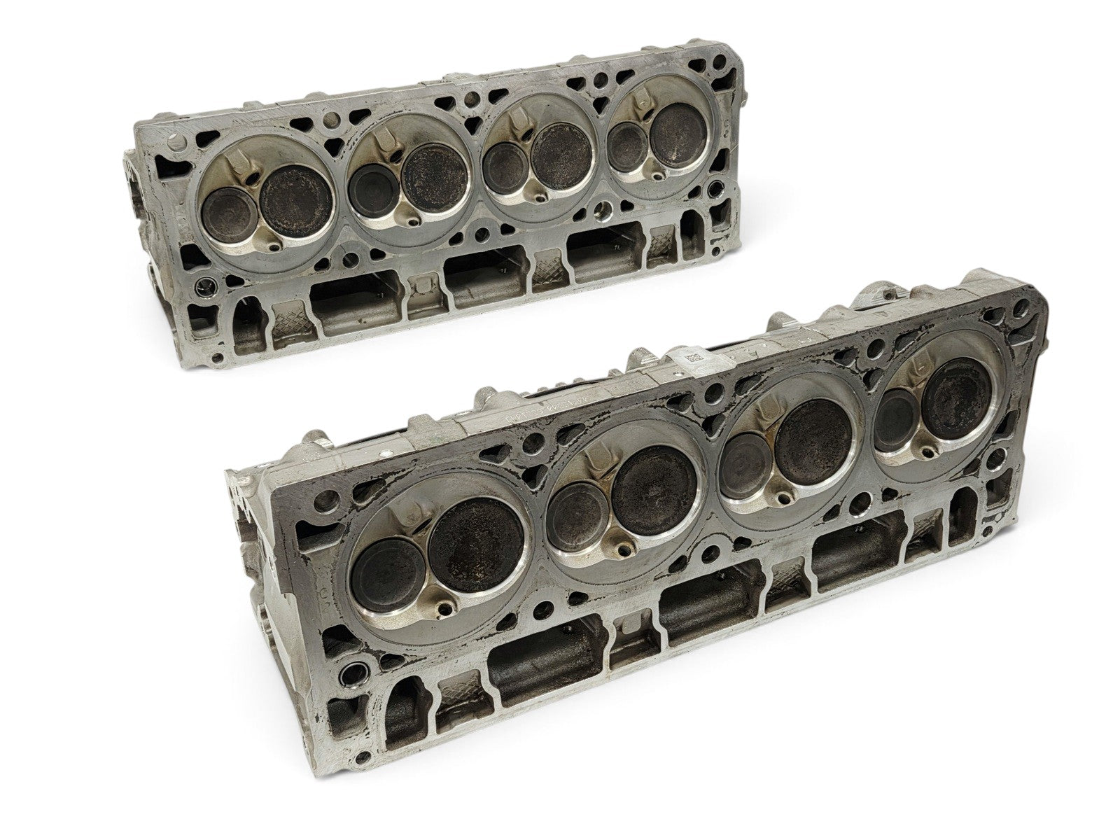 Send it Auto Parts pair of OEM GM LT4 6.2L cylinder heads for Corvette and Camaro engines with lash caps included.