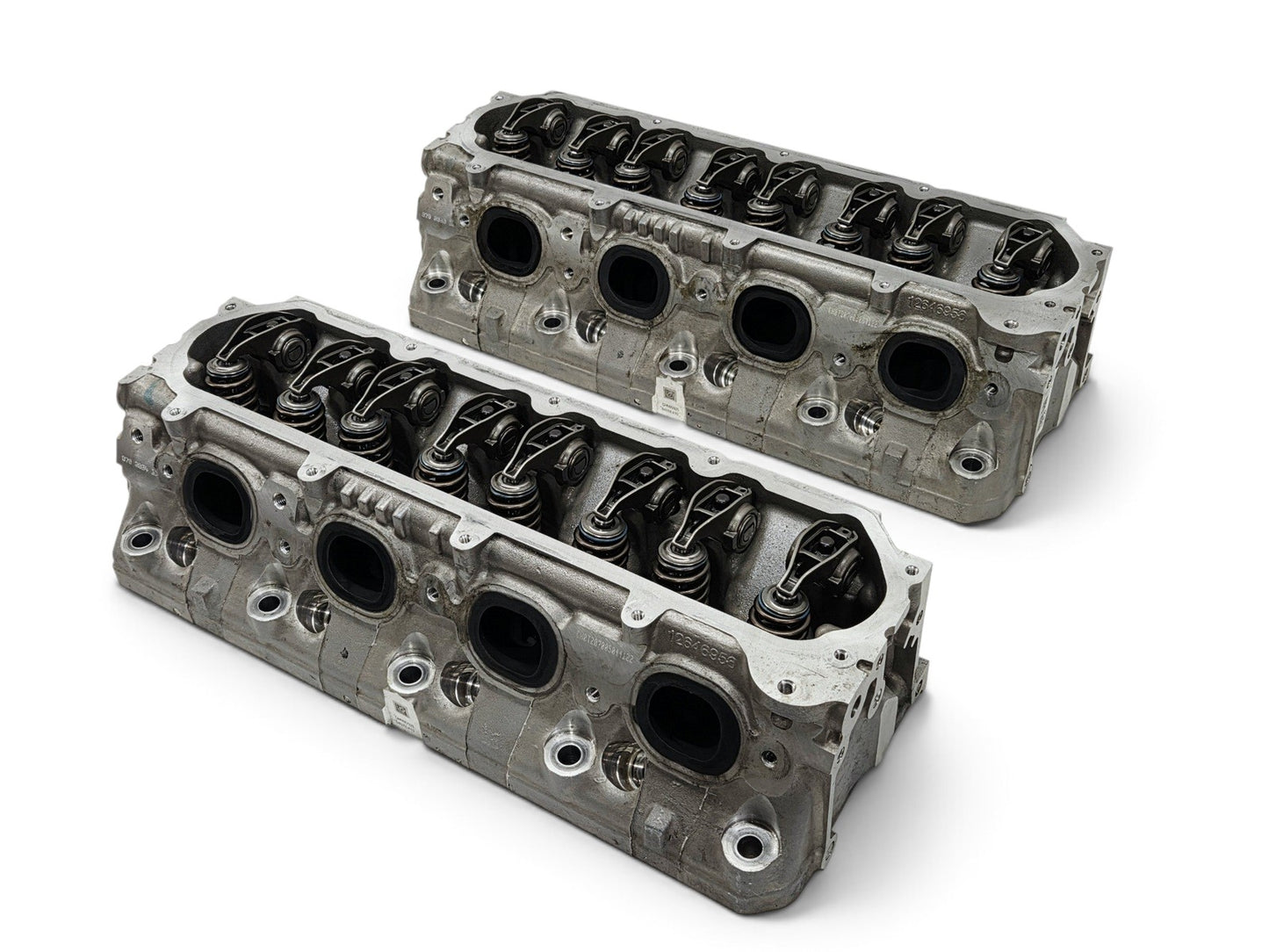 Send it Auto Parts OEM GM LT4 6.2L V8 cylinder heads with lash caps, removed from a low-mileage engine.