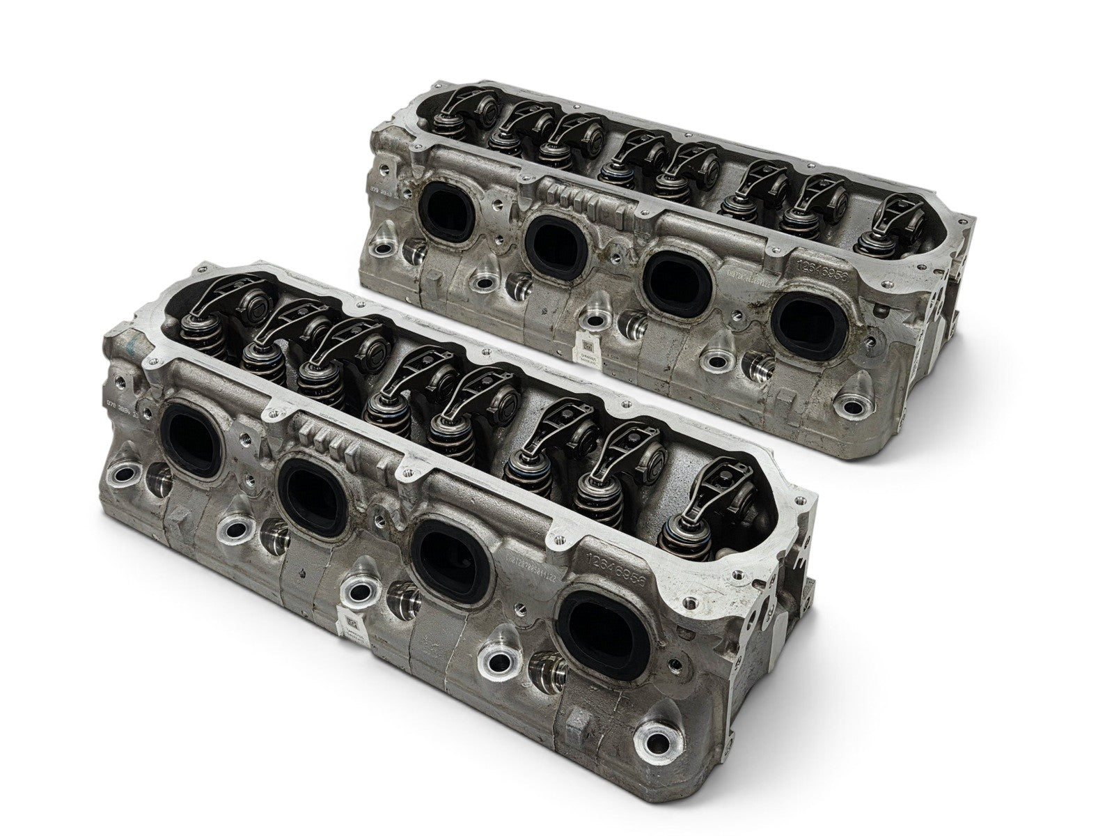 Send it Auto Parts OEM GM LT4 6.2L V8 cylinder heads with lash caps, removed from a low-mileage engine.