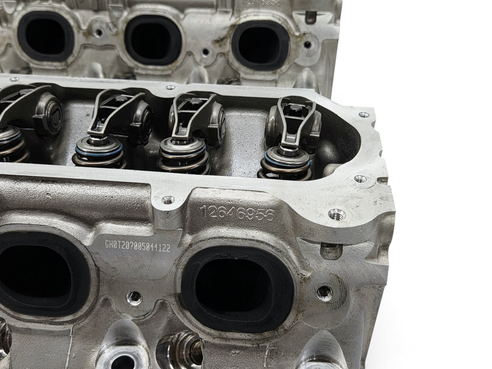 Send it Auto Parts OEM GM LT4 6.2L cylinder heads with lash caps, casting number 12646956, for Corvette and Camaro.