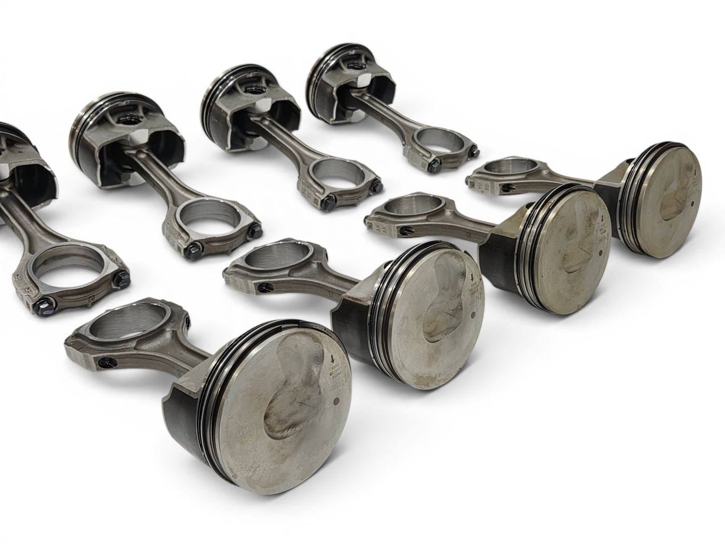 Send it Auto Parts set of eight OEM GM LT4 6.2L supercharged engine pistons and upgraded Pankl connecting rods.