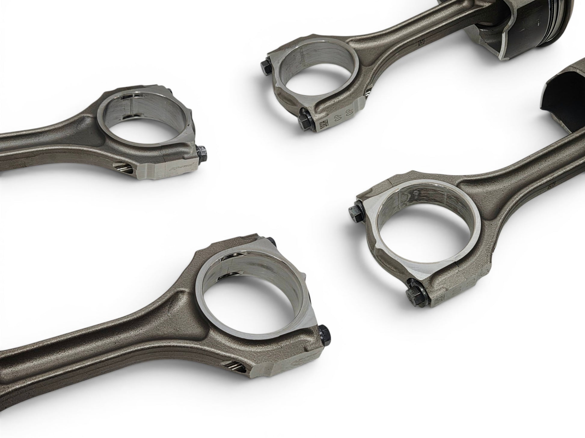 Send it Auto Parts OEM GM LT4 6.2L supercharged engine pistons and upgraded Pankl connecting rods on white background