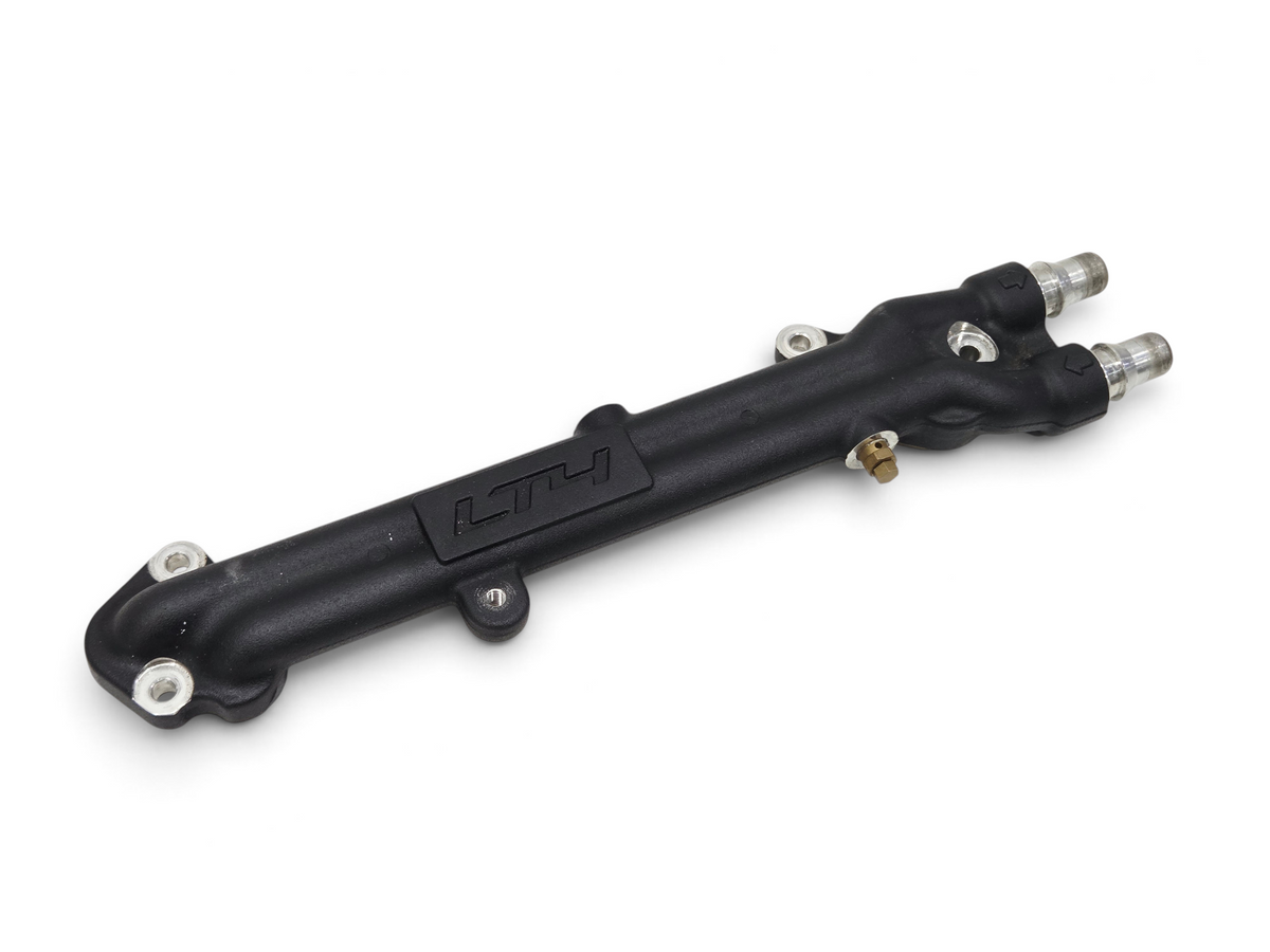 Send it Auto Parts OEM LT4 supercharger water manifold for GM 6.2L V8 engines, black metal finish with LT4 branding.