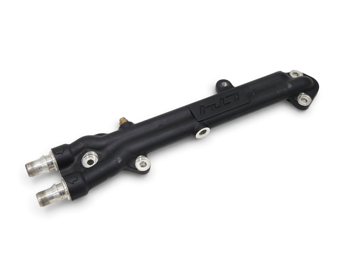 Send it Auto Parts OEM LT4 supercharger water manifold for GM 6.2L V8 engines, black finish with LT4 branding.